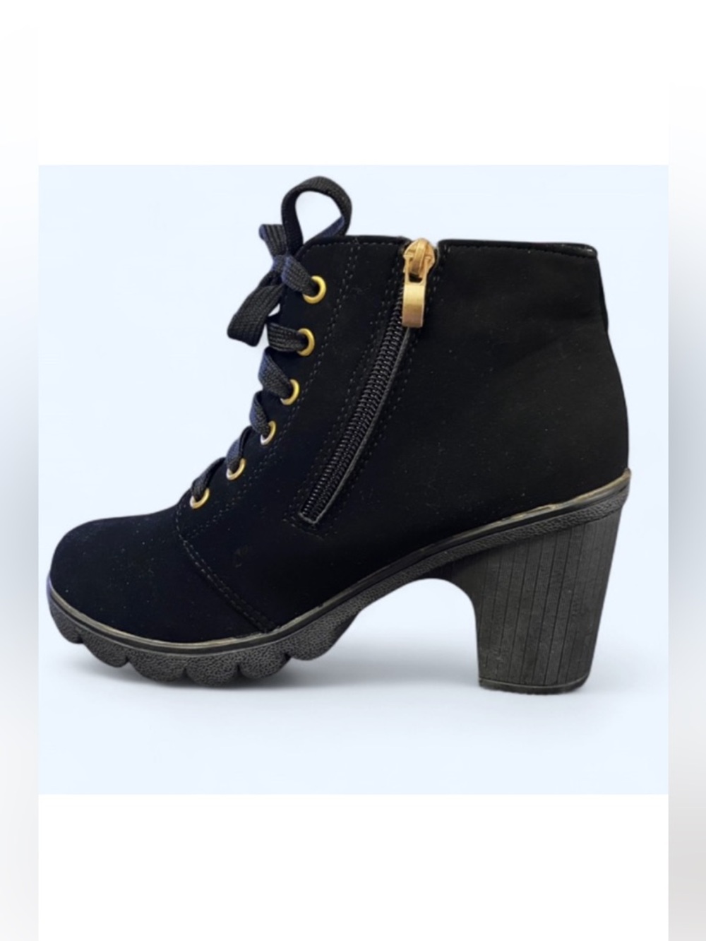 Stylish Black Ankle Boots with Gold Accents women's buckle boots